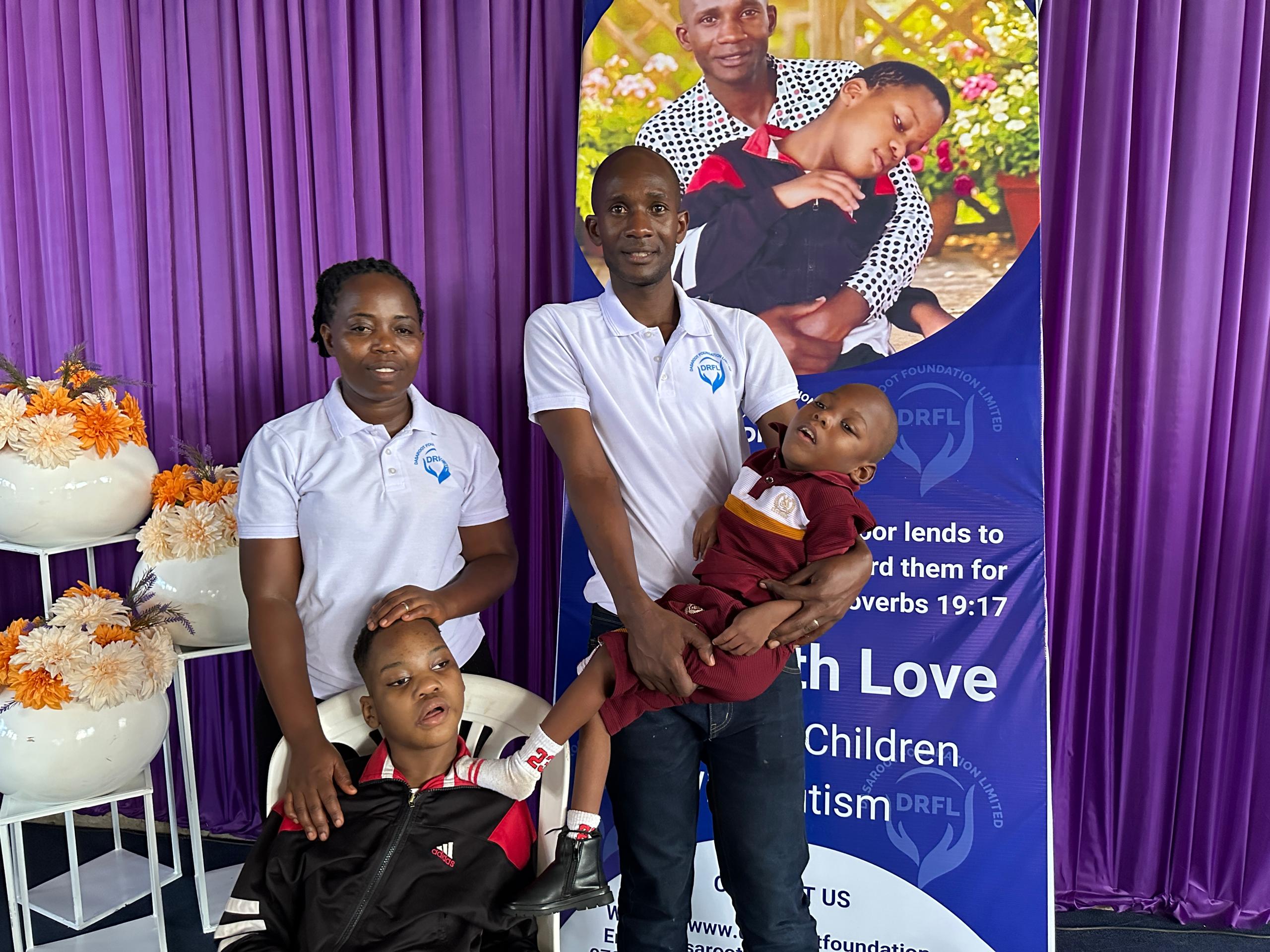 The Dasaroot team with children and families at an outreach event.