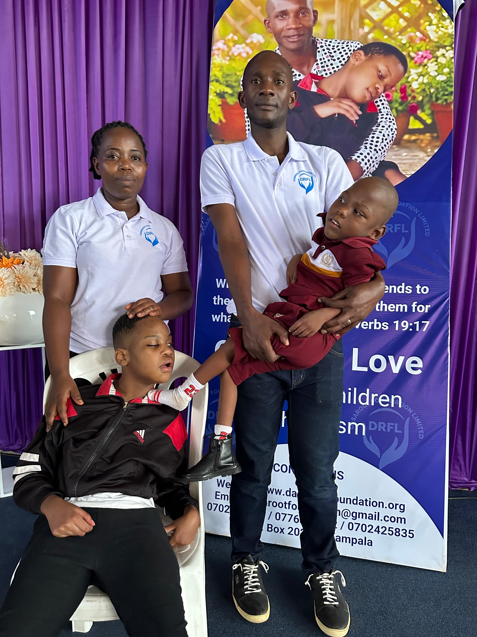 DRFL staff with children during an outreach visit.